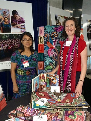 (l-r) Reyna Pretzantzin, president, and Cheryl Conway, director of operations, of the Maya Women's Rug Hooking Group.